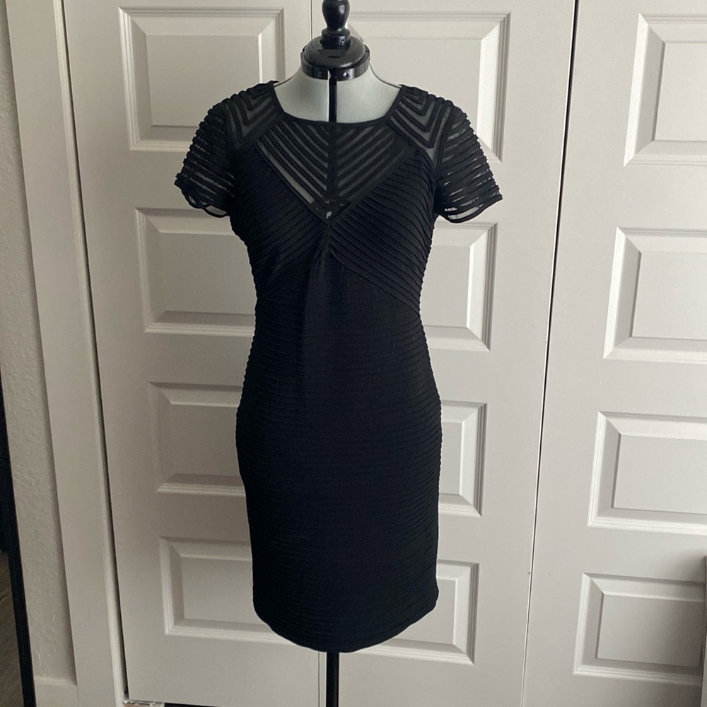 Black illusion neckline cocktail dress Calvin Klein Size 6